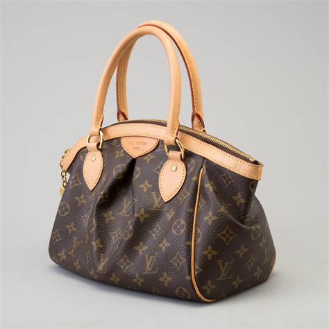 louis vuitton tivoli pm dimensioni|Louis Vuitton tivoli pm price.